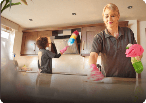 mother son duo cleaning the house