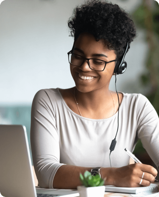A smiling man with phone call in check shirt