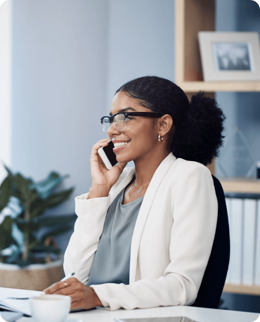 a smiling woman on a phone call