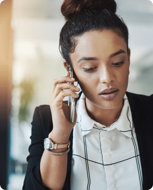 A smiling man with phone call in check shirt