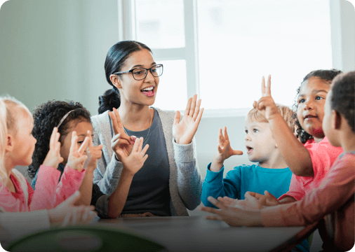 a young teacher teaching some kids