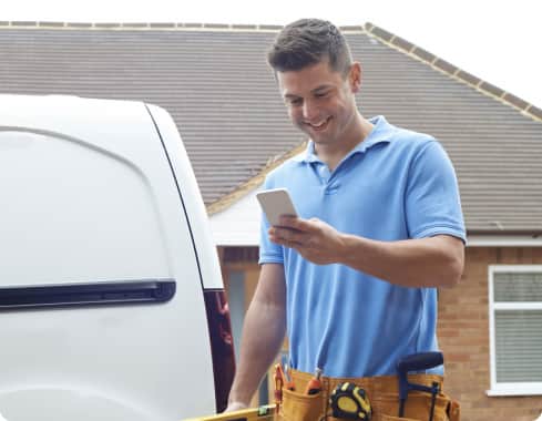 a man looking at his mobile phone